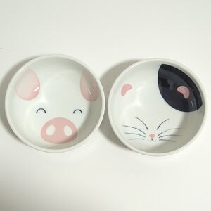 A Pair Of Ceramic Pig and Cat Design Bowls